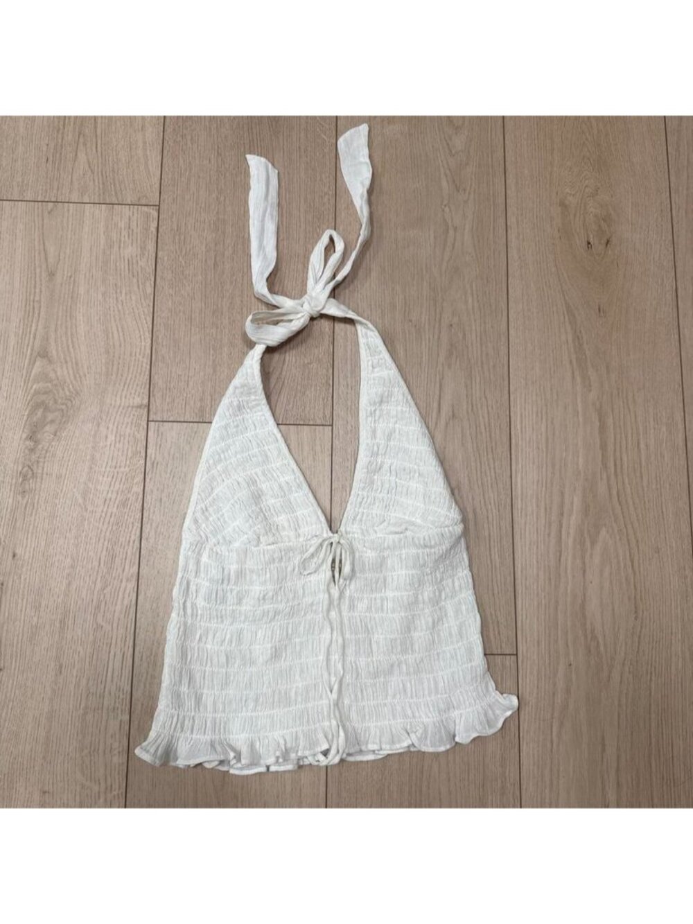 Free people Cream halter crop top with ruffled hem #halter